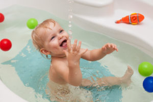 Funny,Little,Baby,Girl,In,The,Bath,Playing,With,Water