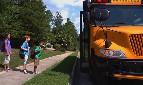 Kids-Waiting-to-Board-Bus